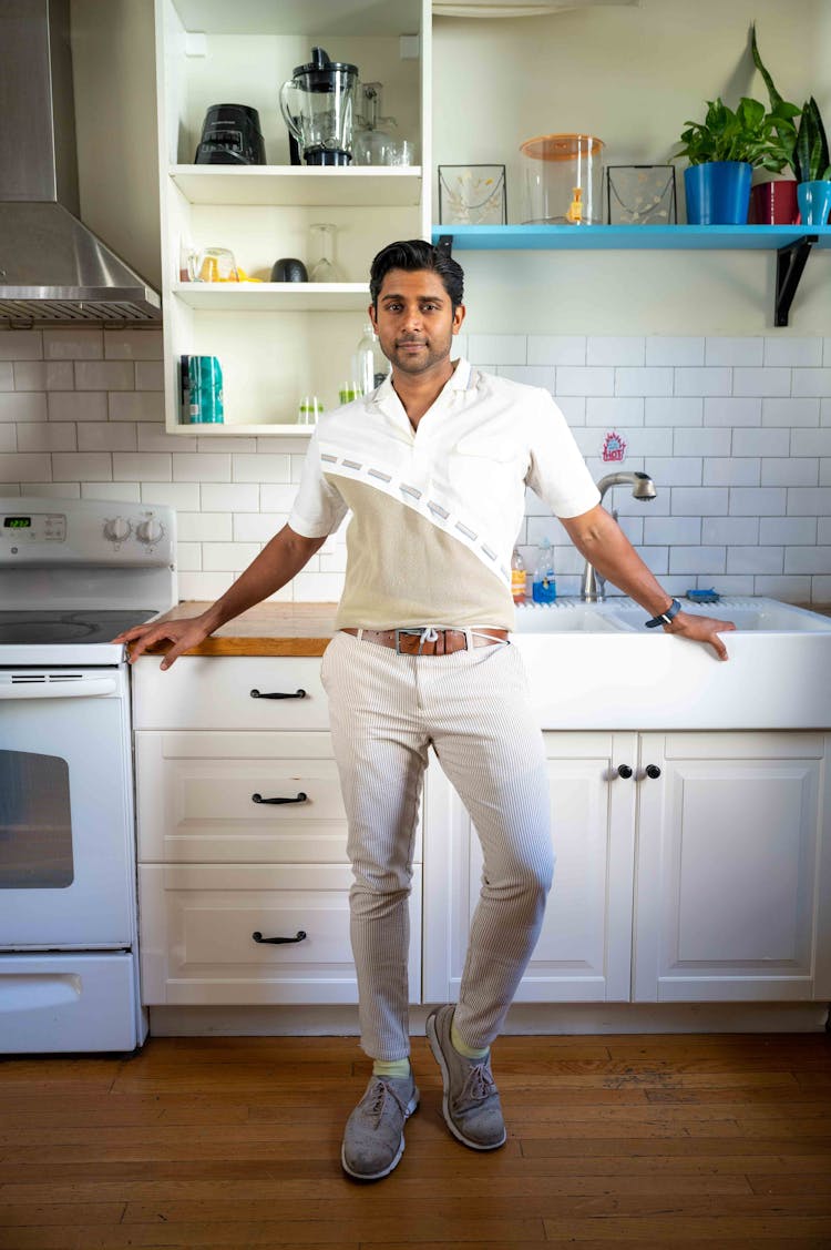 Man stands in front of kitchen